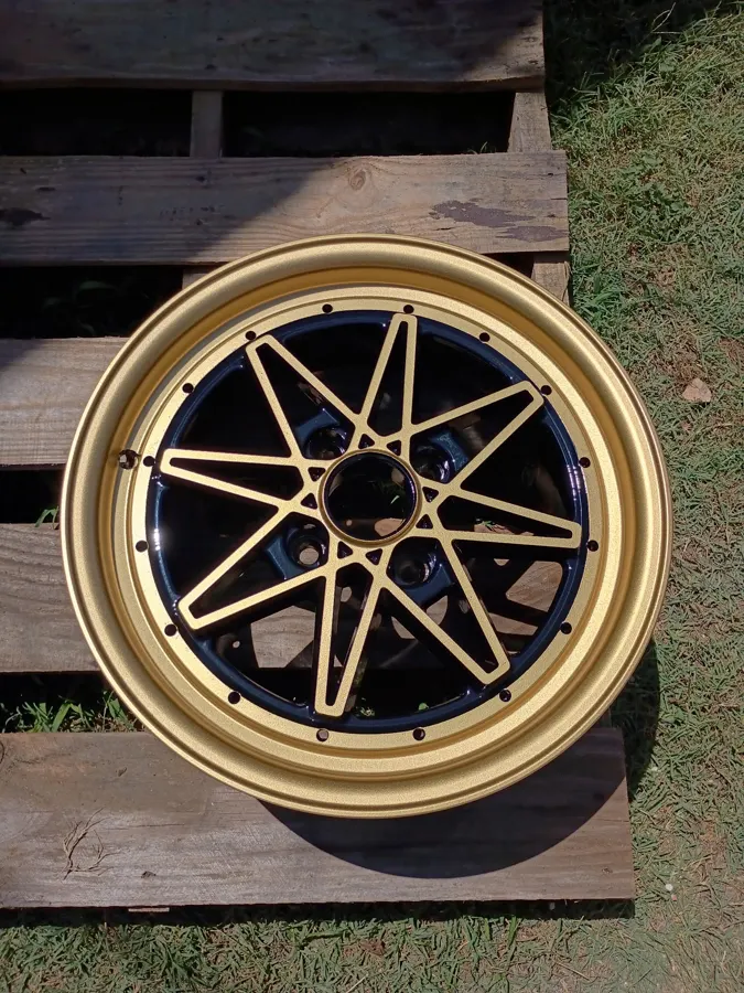 Star-spoke wheel powder coated two-tone gold and black
