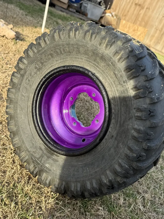 ATV wheel powder coated in candy purple